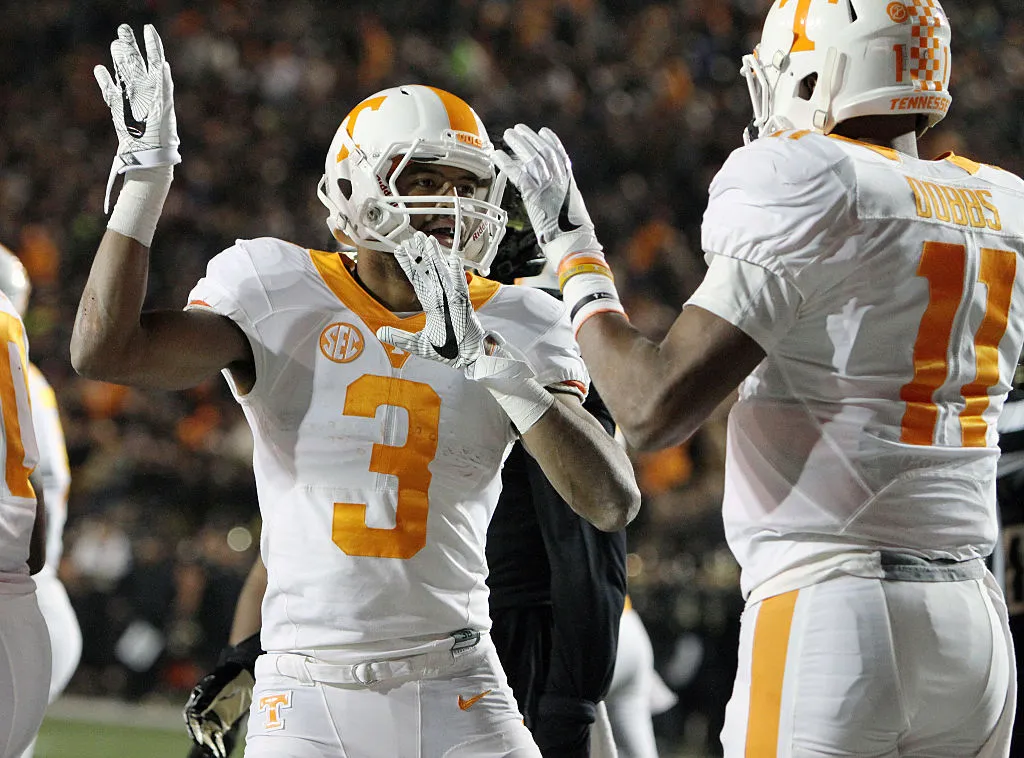 NASHVILLE, TN - NOVEMBER 26: Tennessee wide receiver Josh Malone (3) and quarterback Joshua Dobbs (11) celebrate a touchdown during the first half of the No. 17 Tennessee Volunteers 45-34 loss to the Vanderbilt Commodores on November 26, 2016, at Vanderbilt Stadium in Nashville, Tenn.  (Photo by Matthew Maxey/Icon Sportswire via Getty Images)