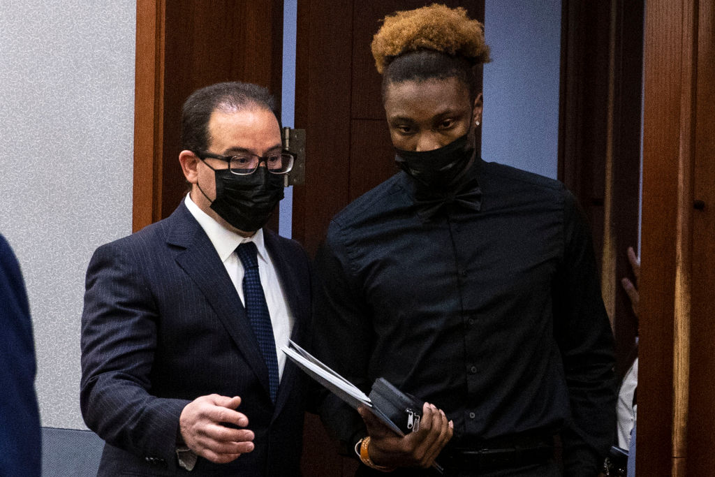 LAS VEGAS, NEVADA - NOVEMBER 22: Former Las Vegas Raiders player Henry Ruggs III (R) appears in court with his attorney Richard Schonfeld at the Regional Justice Center on November 22, 2021 in Las Vegas, Nevada. Ruggs has been ordered to wear an ankle monitor to measure his alcohol level after he missed a court-ordered test. Ruggs faces DUI charges after a fatal car crash. (Photo by Bizuayehu Tesfaye-Pool/Getty Images)
