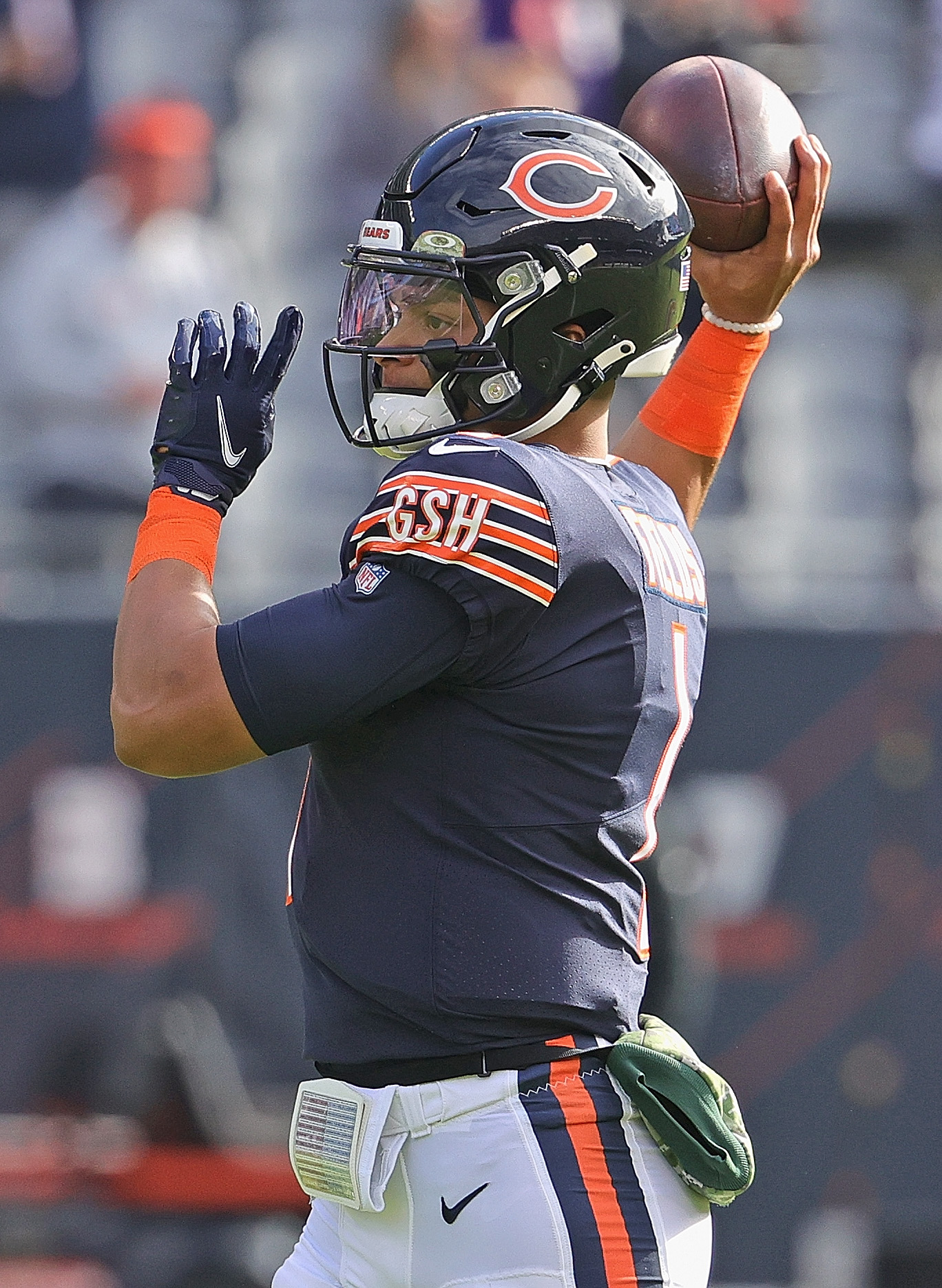 CHICAGO, ILLINOIS - NOVEMBER 21: Justin Fields #1 of the Chicago Bears participates in warm-ups before a game against the Baltimore Ravens at Soldier Field on November 21, 2021 in Chicago, Illinois. The Ravens defeated the Bears 16-13. (Photo by Jonathan Daniel/Getty Images)