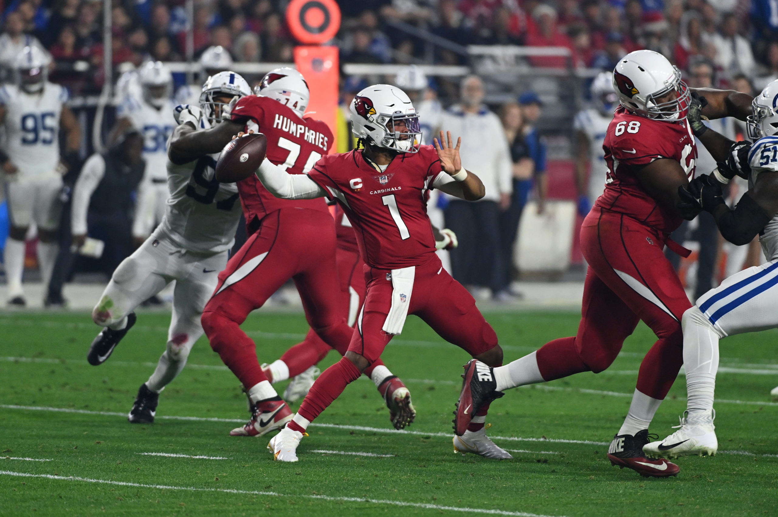 GLENDALE, ARIZONA - DECEMBER 25: Kyler Murray #1 of the Arizona Cardinals looks to throw the ball against the Indianapolis Colts at State Farm Stadium on December 25, 2021 in Glendale, Arizona. (Photo by Norm Hall/Getty Images)