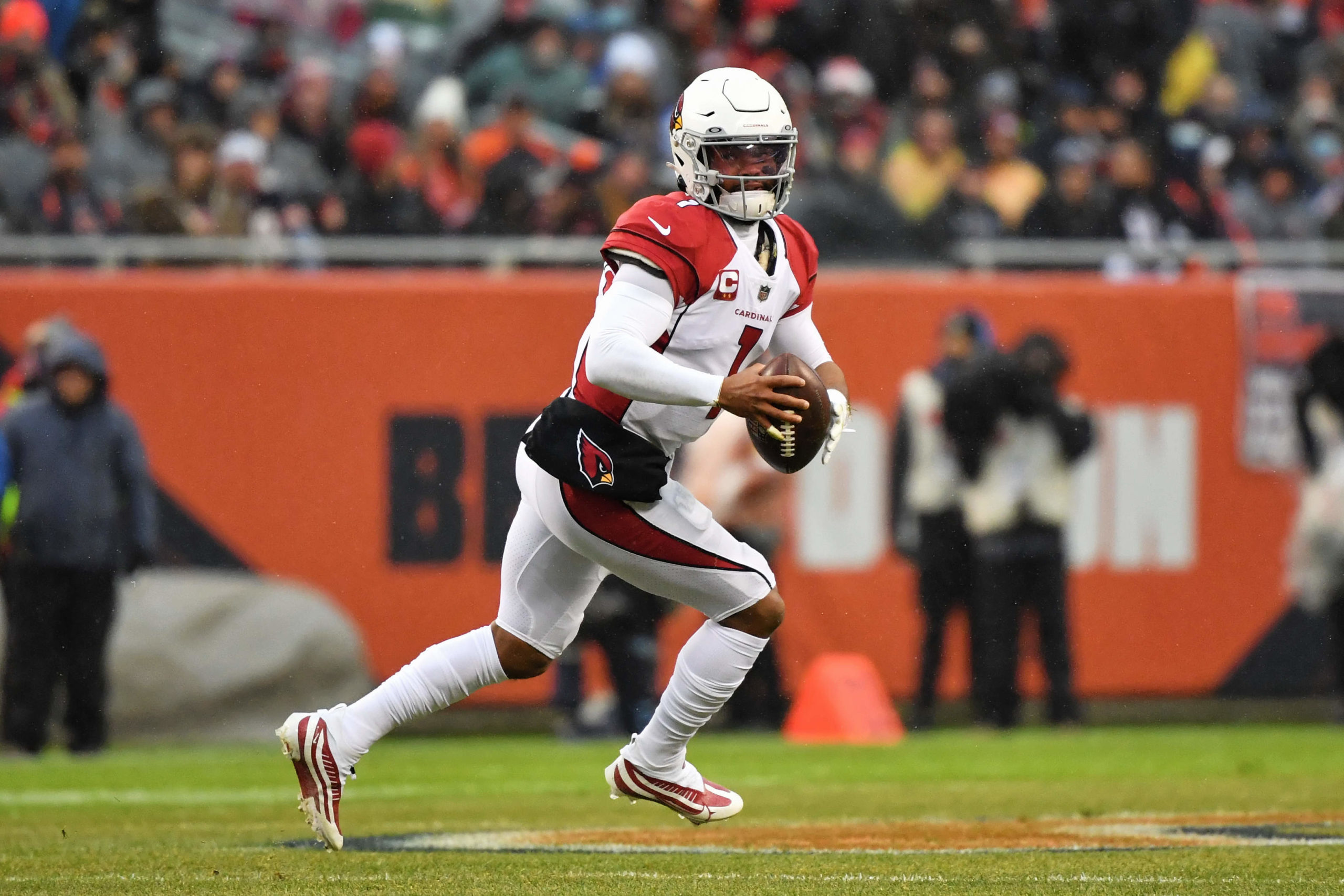 CHICAGO, ILLINOIS - DECEMBER 05:  Quarterback Kyler Murray #1 of the Arizona Cardinals runs with the ball against the Chicago Bears at Soldier Field on December 05, 2021 in Chicago, Illinois.  (Photo by Jamie Sabau/Getty Images)