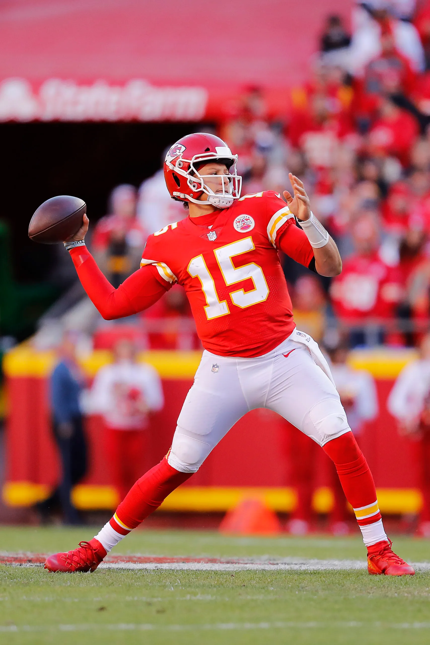 KANSAS CITY, MISSOURI - DECEMBER 12: Patrick Mahomes #15 of the Kansas City Chiefs throws the ball during the fourth quarter against the Las Vegas Raiders at Arrowhead Stadium on December 12, 2021 in Kansas City, Missouri. (Photo by David Eulitt/Getty Images)