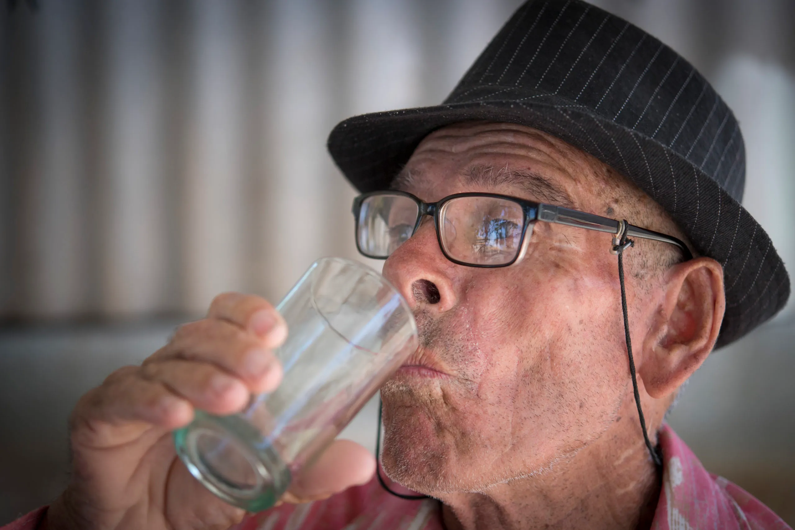 TUNAS DE ZAZA, SANCTI SPIRITUS, CUBA - 2017/03/10: Alcoholism: Cuban senior man drinking rum in the afternoon. Rum is cheap in the Caribbean island. (Photo by Roberto Machado Noa/LightRocket via Getty Images)