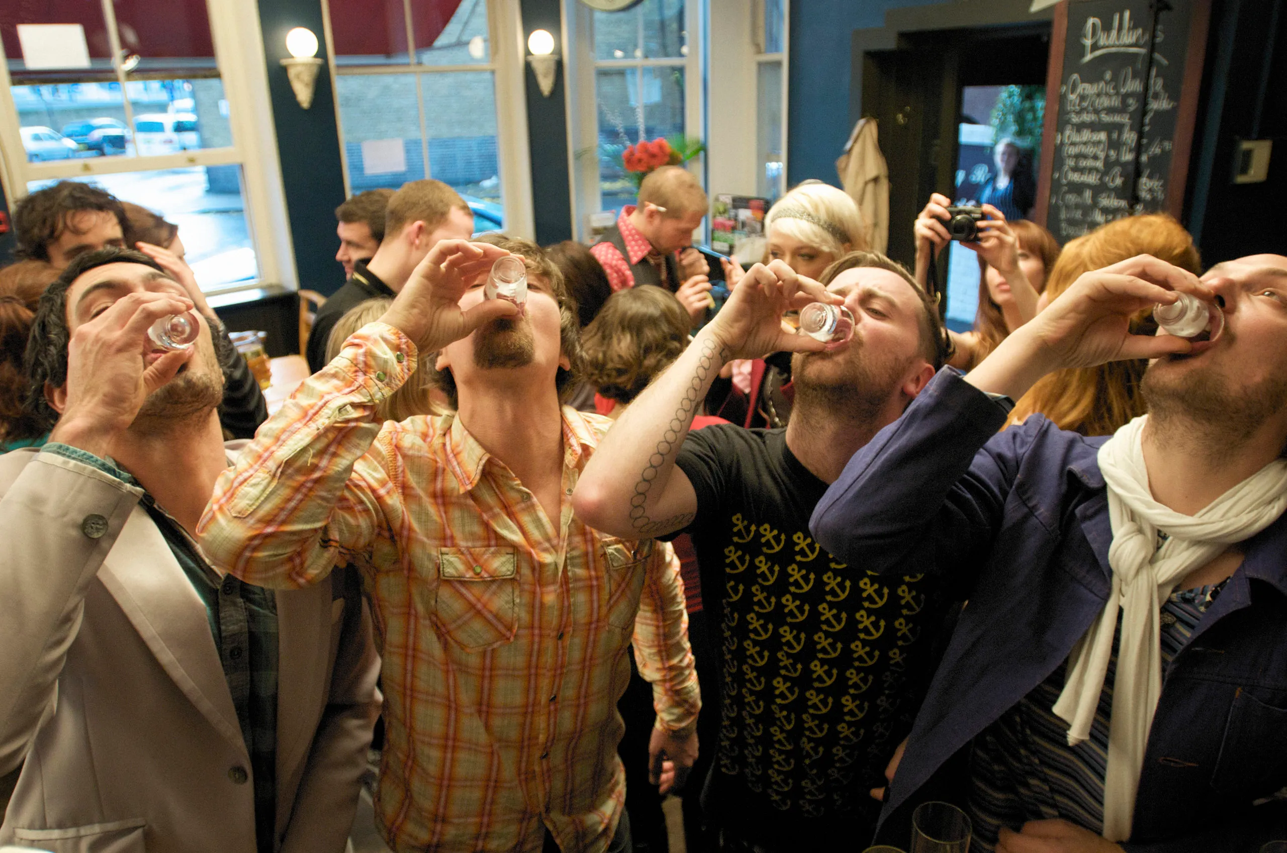 riotous drinking party in public bar