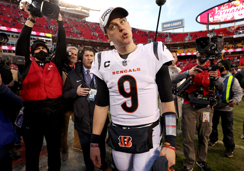 KANSAS CITY, MISSOURI - JANUARY 30: Quarterback Joe Burrow #9 of the Cincinnati Bengals reacts following the Bengals 27-24 overtime win against the Kansas City Chiefs in the AFC Championship Game at Arrowhead Stadium on January 30, 2022 in Kansas City, Missouri. (Photo by Jamie Squire/Getty Images)
