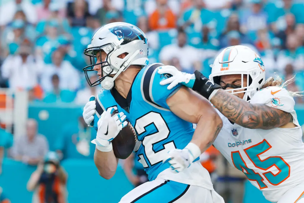 MIAMI GARDENS, FLORIDA - NOVEMBER 28: Christian McCaffrey #22 of the Carolina Panthers during their game against the Miami Dolphins at Hard Rock Stadium on November 28, 2021 in Miami Gardens, Florida. (Photo by Cliff Hawkins/Getty Images)