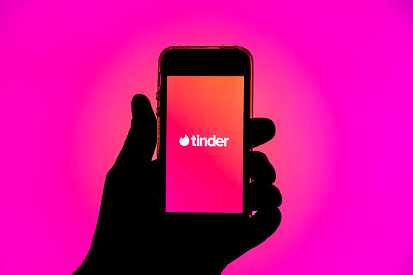 SPAIN - 2021/03/30: In this photo illustration, the Tinder app seen displayed on a smartphone screen. (Photo Illustration by Thiago Prudêncio/SOPA Images/LightRocket via Getty Images)
