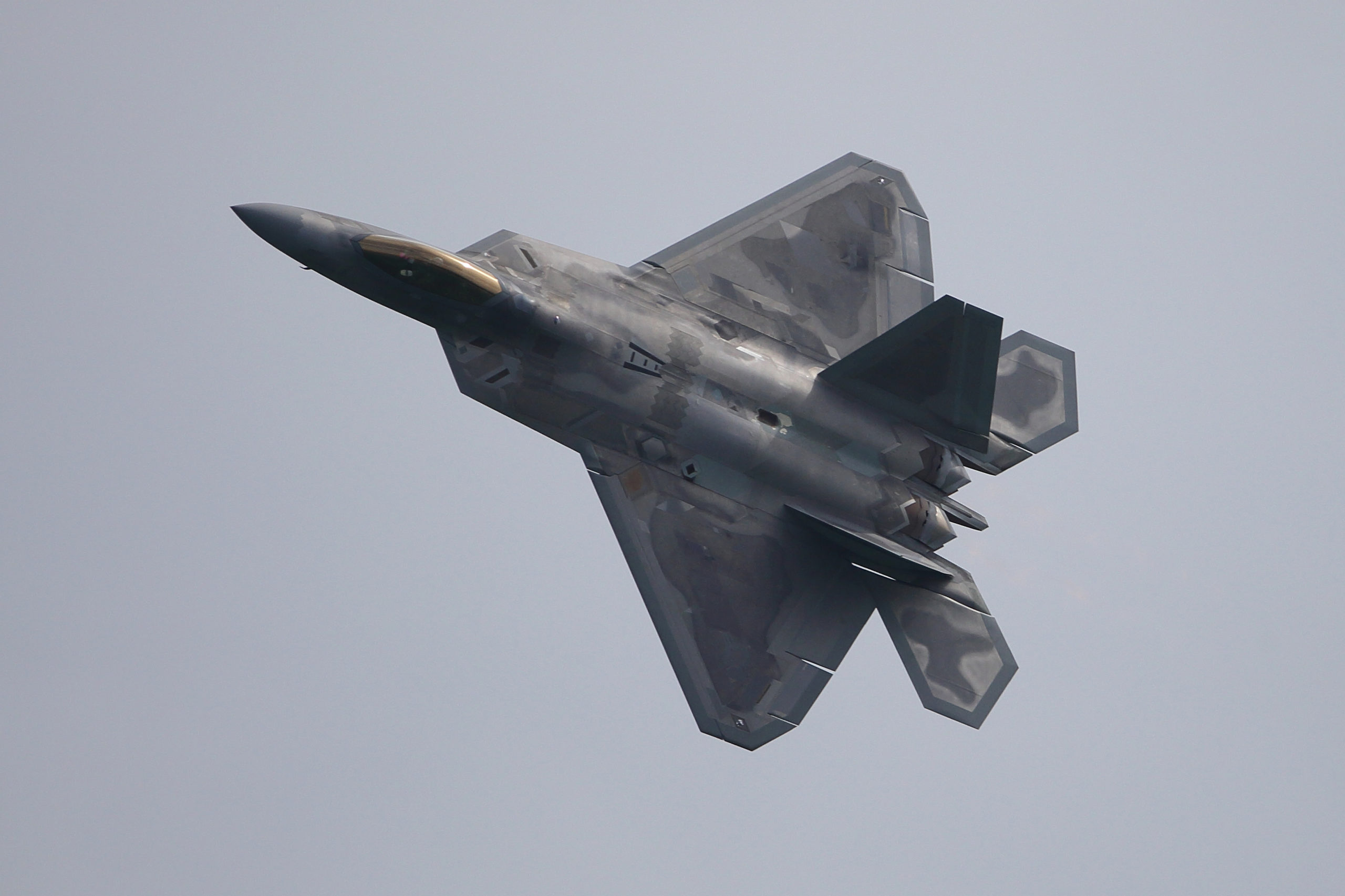 SINGAPORE - FEBRUARY 09:  A United States Air Force F-22 Raptor fighter jet performs an aerial display during the Singapore Airshow media preview on February 9, 2020 in Singapore.  (Photo by Suhaimi Abdullah/Getty Images)