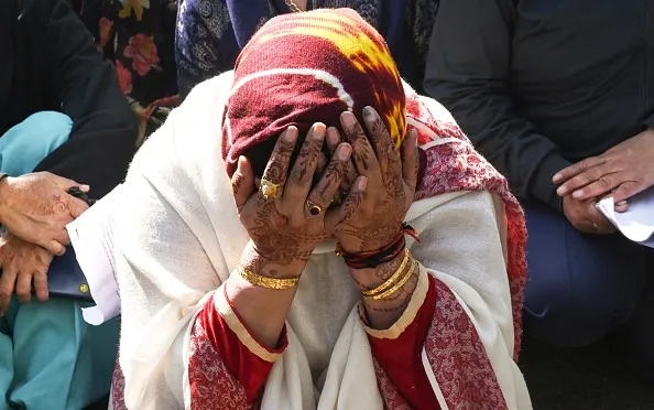 NEW DELHI, INDIA - FEBRUARY 13: Residents weeping and pleading to the authorities, during Demolition drive by DDA near Bus Stand in Mehrauli on February 13, 2023 in New Delhi, India. The anti-encroachment drive in New Delhi's Mehrauli continued for the fourth consecutive day on Monday amid heavy police and para-military forces deployment. A large number of locals whose structures were declared illegal held a protest and created a commotion while demanding the action to be stopped. (Photo by Vipin Kumar/Hindustan Times via Getty Images)