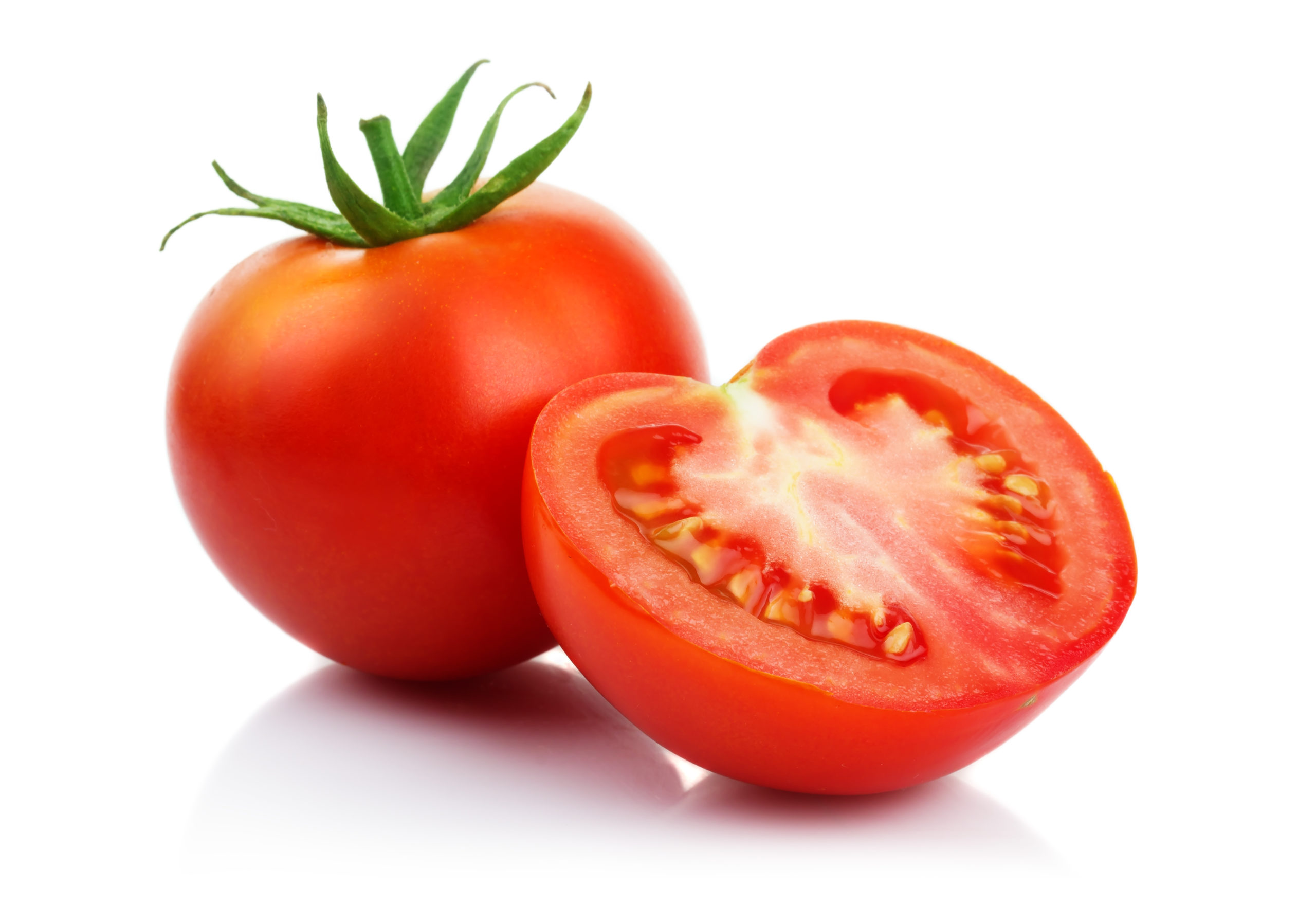 Red tomatoes with cut isolated on white background