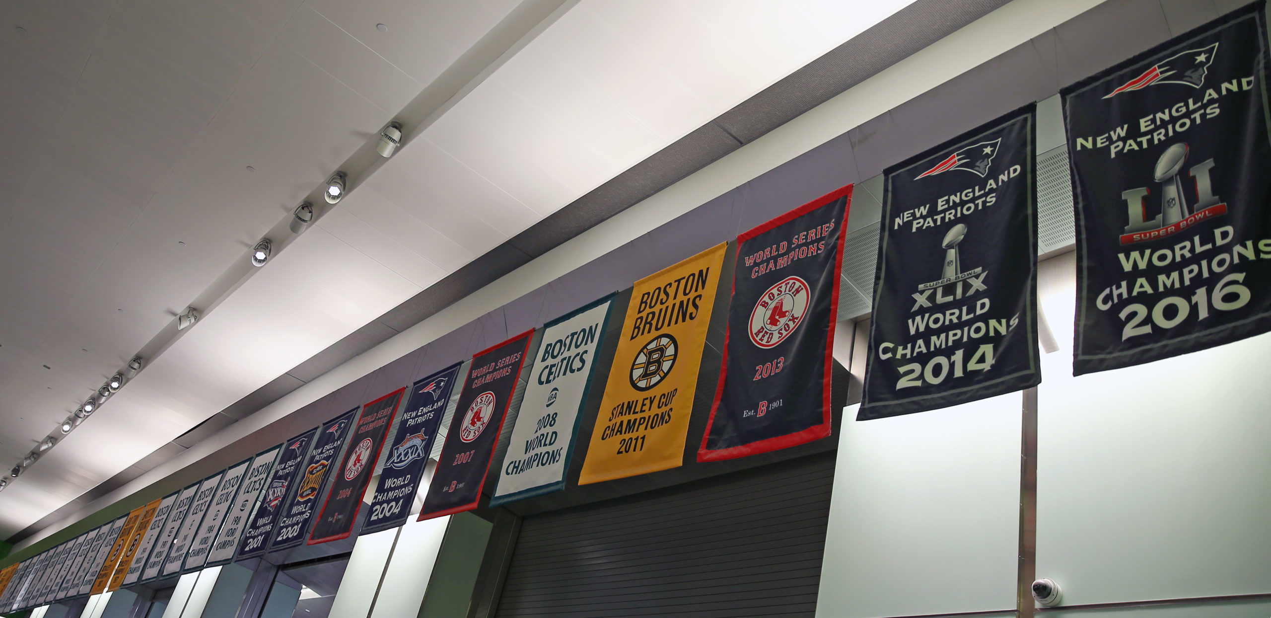 Championship Banners Hang At Logan Airport