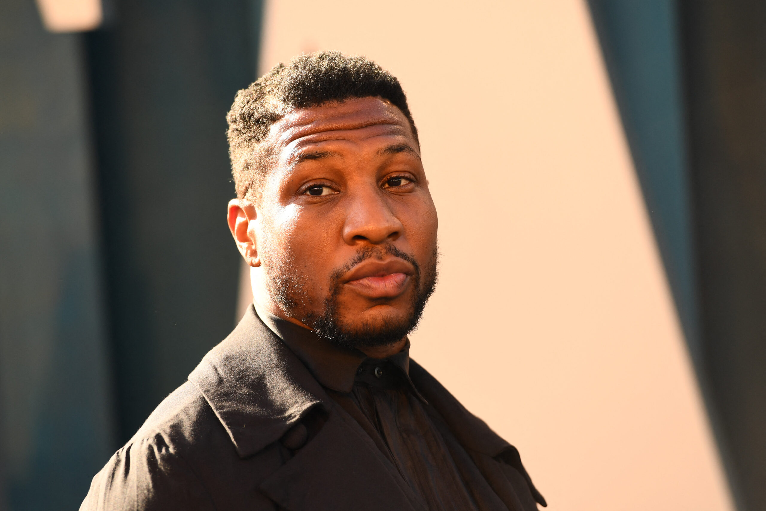 Jonathan Majors attends the 2022 Vanity Fair Oscar Party following the 94th Oscars at the The Wallis Annenberg Center for the Performing Arts in Beverly Hills, California on March 27, 2022. (Photo by Patrick T. FALLON / AFP) (Photo by PATRICK T. FALLON/AFP via Getty Images)