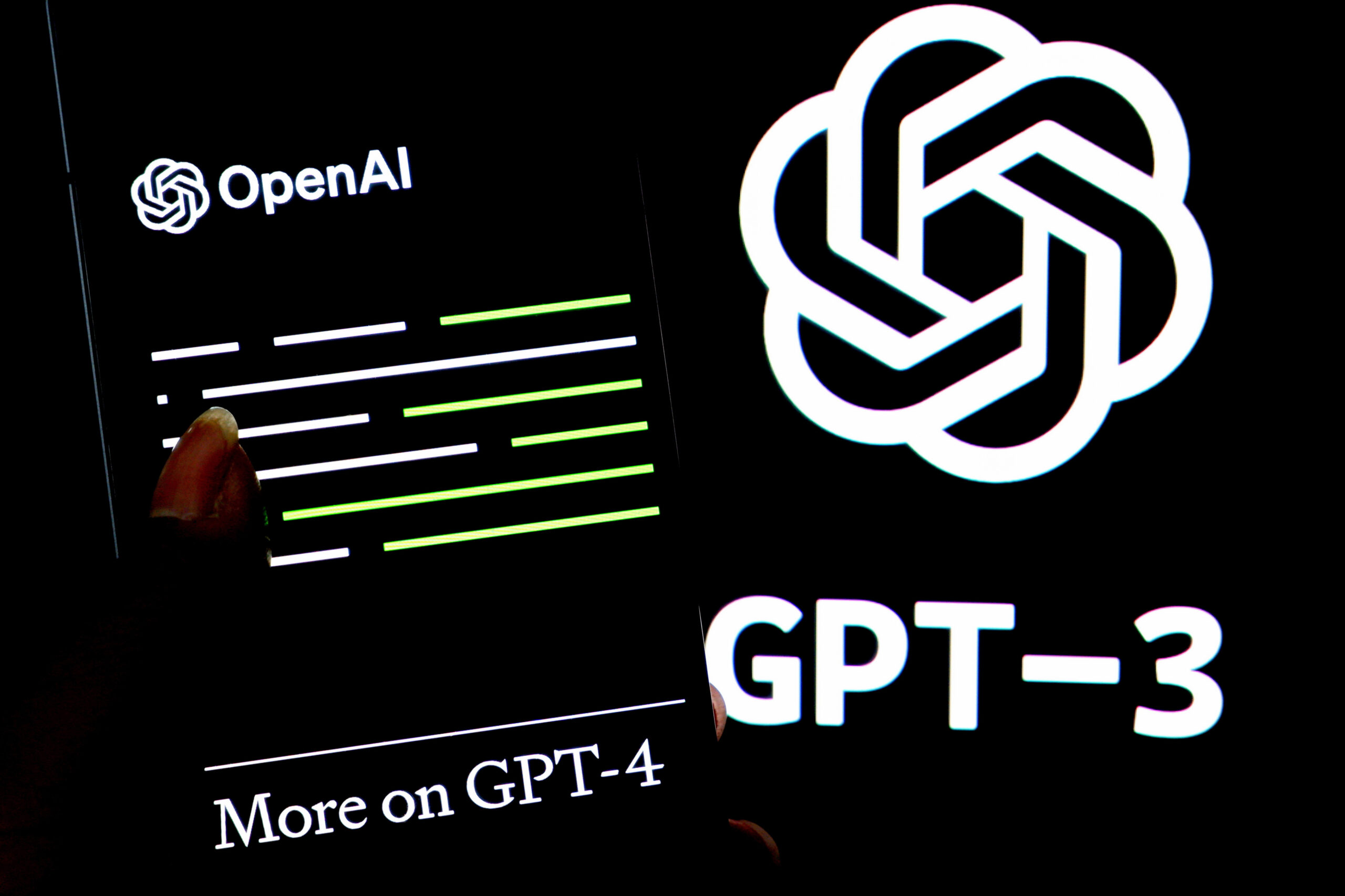 INDIA - 2023/03/23: In this photo illustration, an OPEN AI GPT 4 logo is displayed on a smartphone with a Chat GPT 3 logo in the background. (Photo Illustration by Avishek Das/SOPA Images/LightRocket via Getty Images)