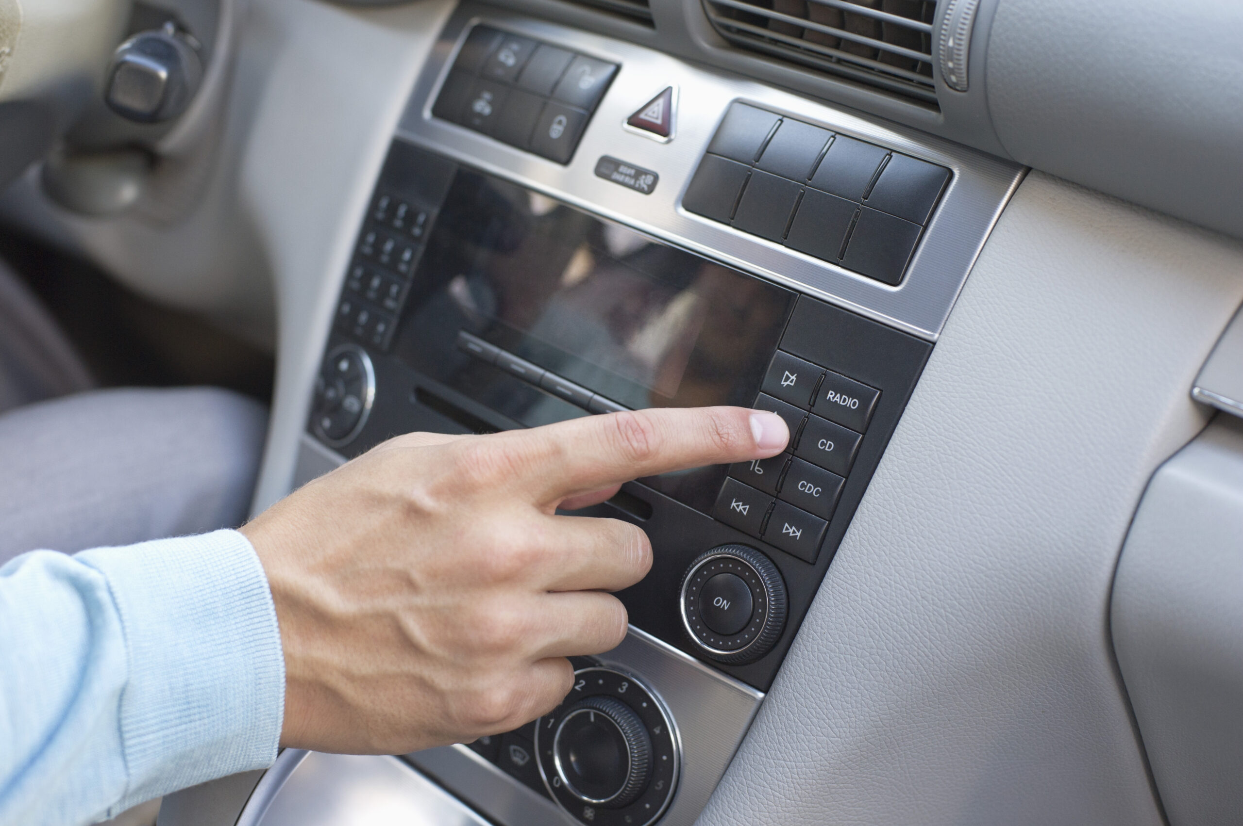 Man playing the music in car