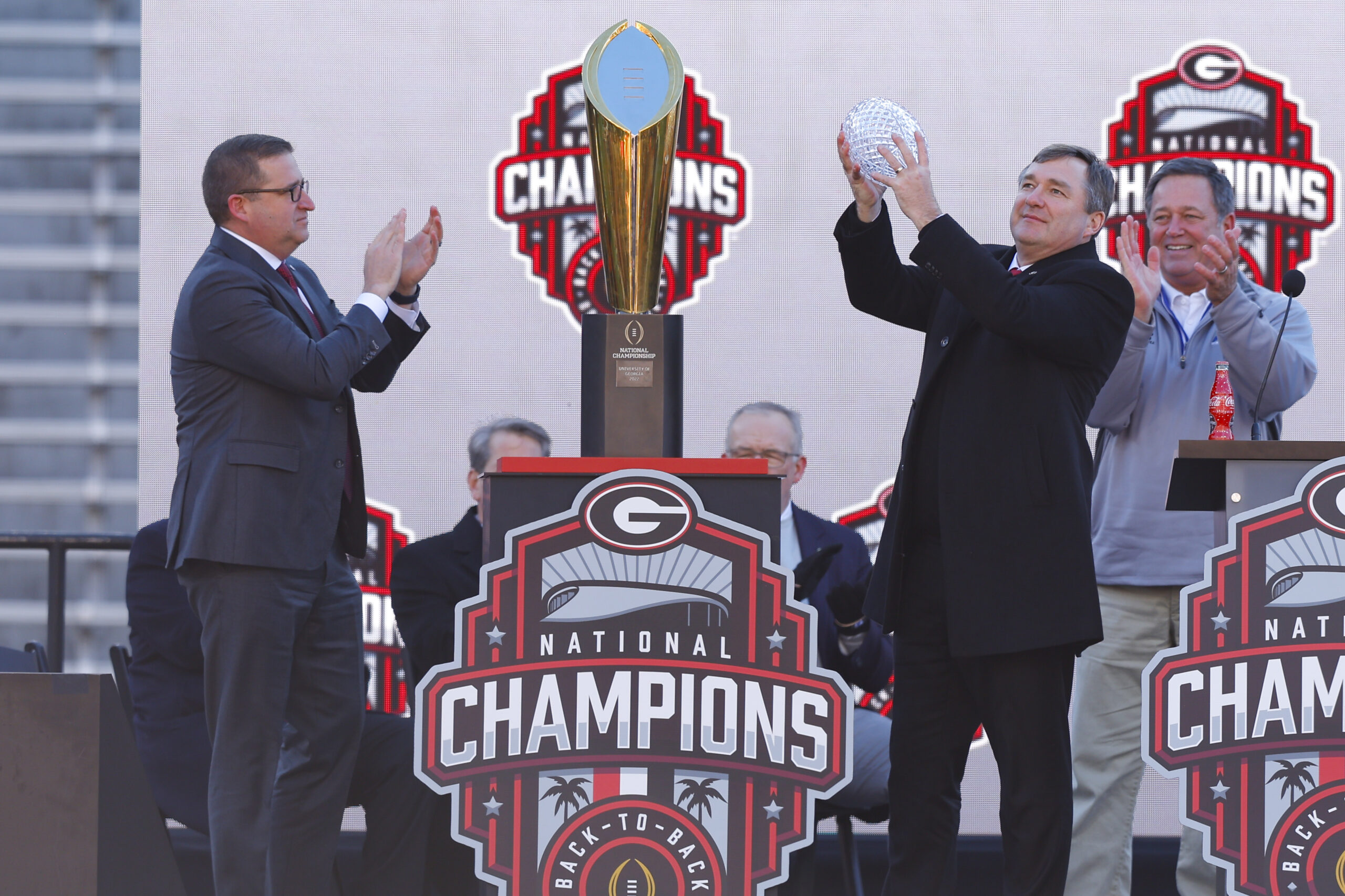 ATHENS, GA - JANUARY 14: Head coach Kirby Smart of the Georgia Bulldogs holds up the coaches trophy during the national championship celebration on January 14, 2023 in Athens, Georgia. (Photo by Todd Kirkland/Getty Images)