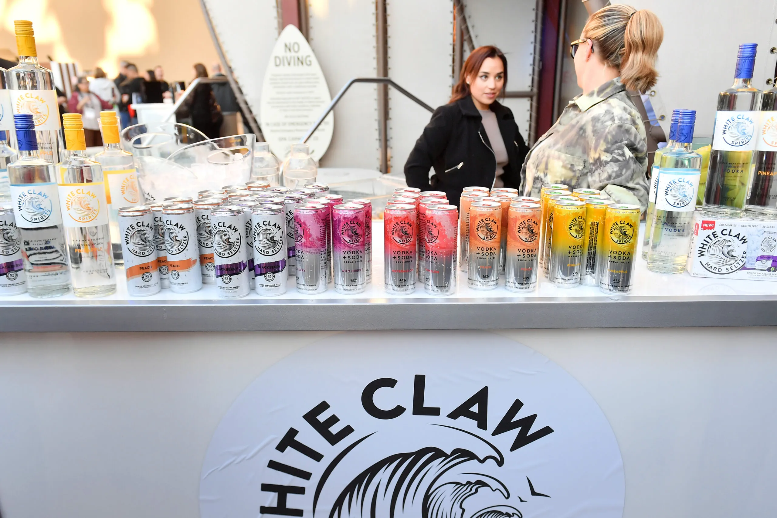 LAS VEGAS, NEVADA - MARCH 27: White Claw seltzers on display at the 2023 Bar & Restaurant Expo and World Tea Expo Welcome Kickoff Party at AYU Dayclub at Resorts World Las Vegas on March 27, 2023 in Las Vegas, Nevada. (Photo by Bryan Steffy/Getty Images for Nightclub & Bar Media Group)
