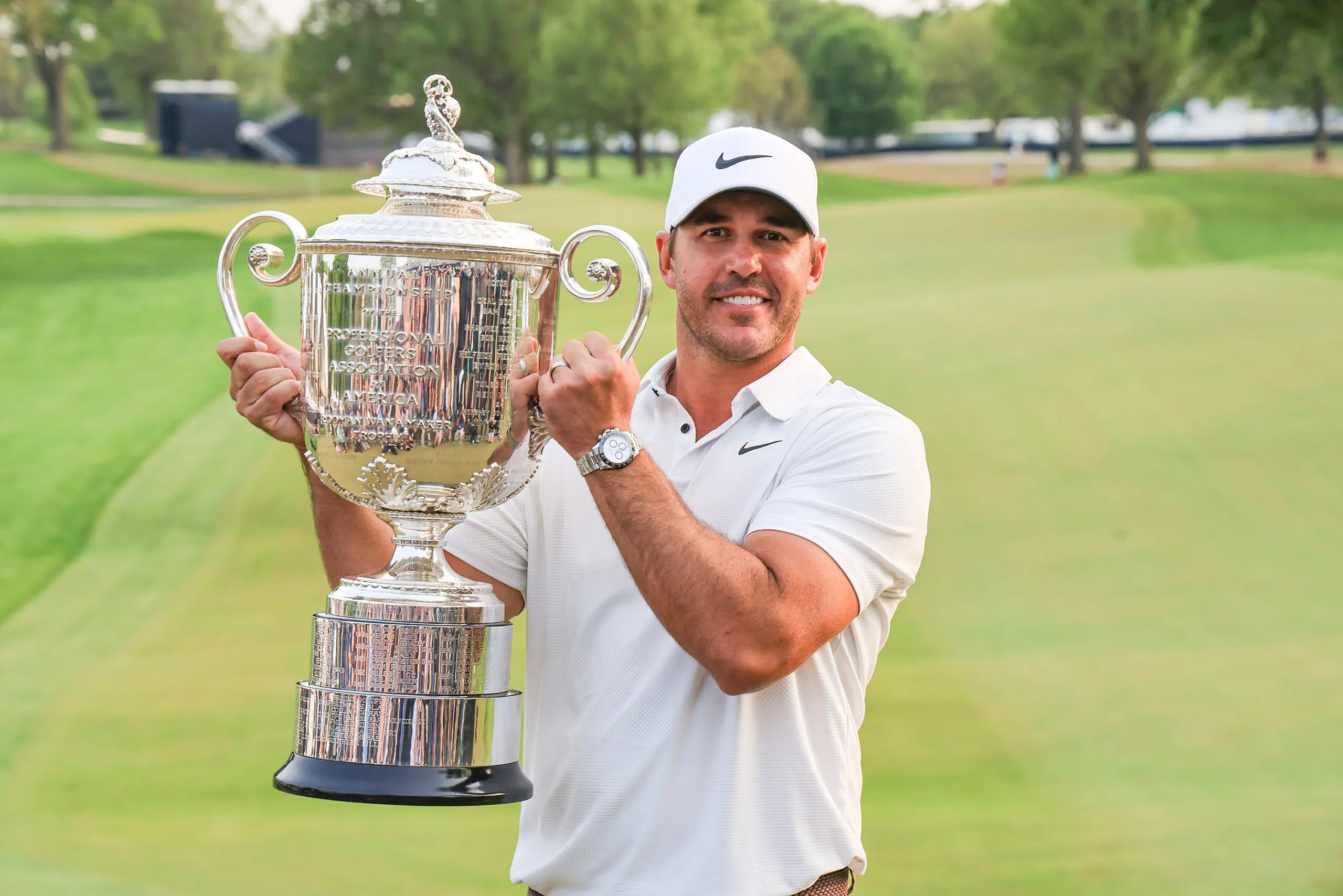 ROCHESTER, NEW YORK - MAY 21: Brooks Koepka of The United States holds the Wanamaker Trophy after his win the final round of the 2023 PGA Championship at Oak Hill Country Club on May 21, 2023 in Rochester, New York. (Photo by David Cannon/Getty Images)