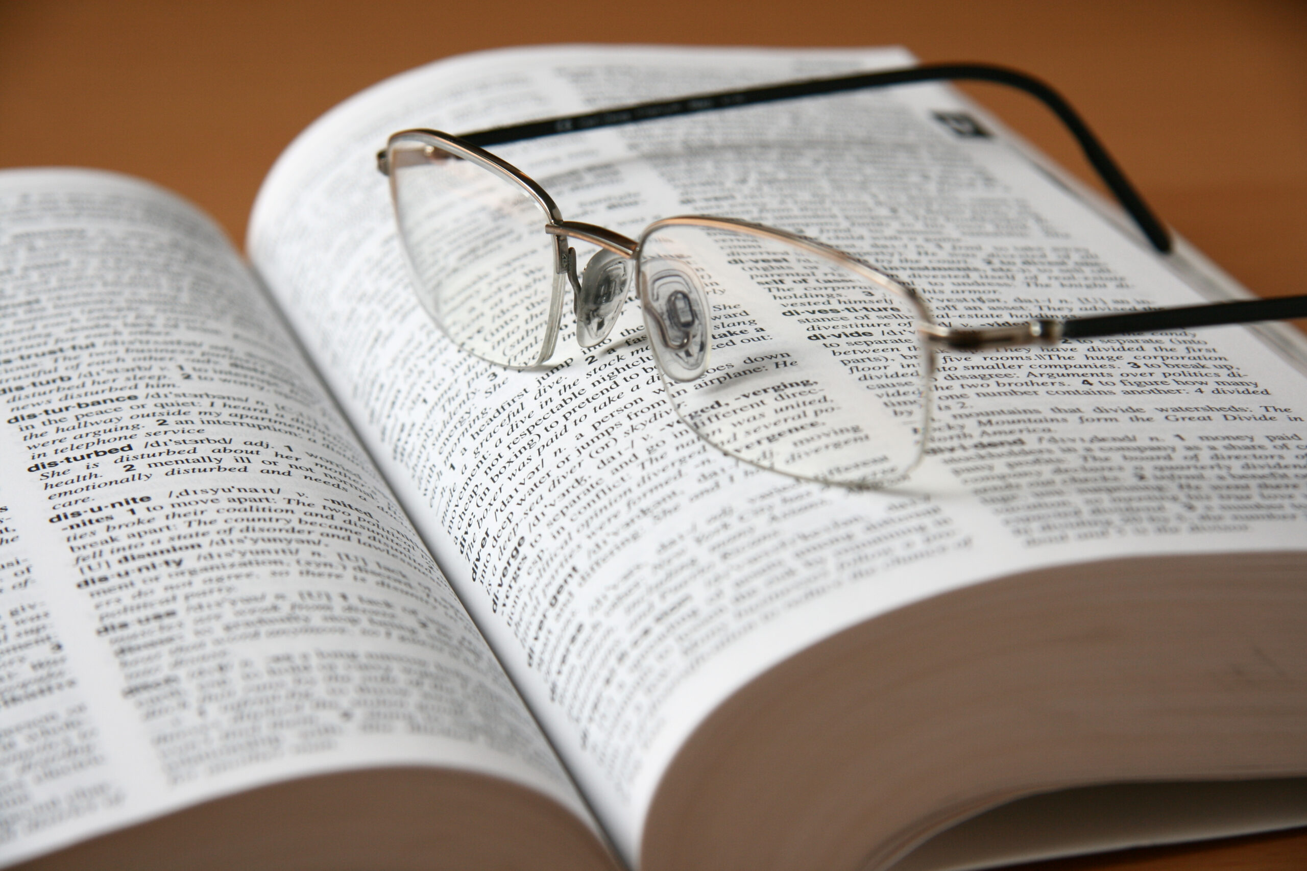 "Eyeglasses and book, learning, study, reading"