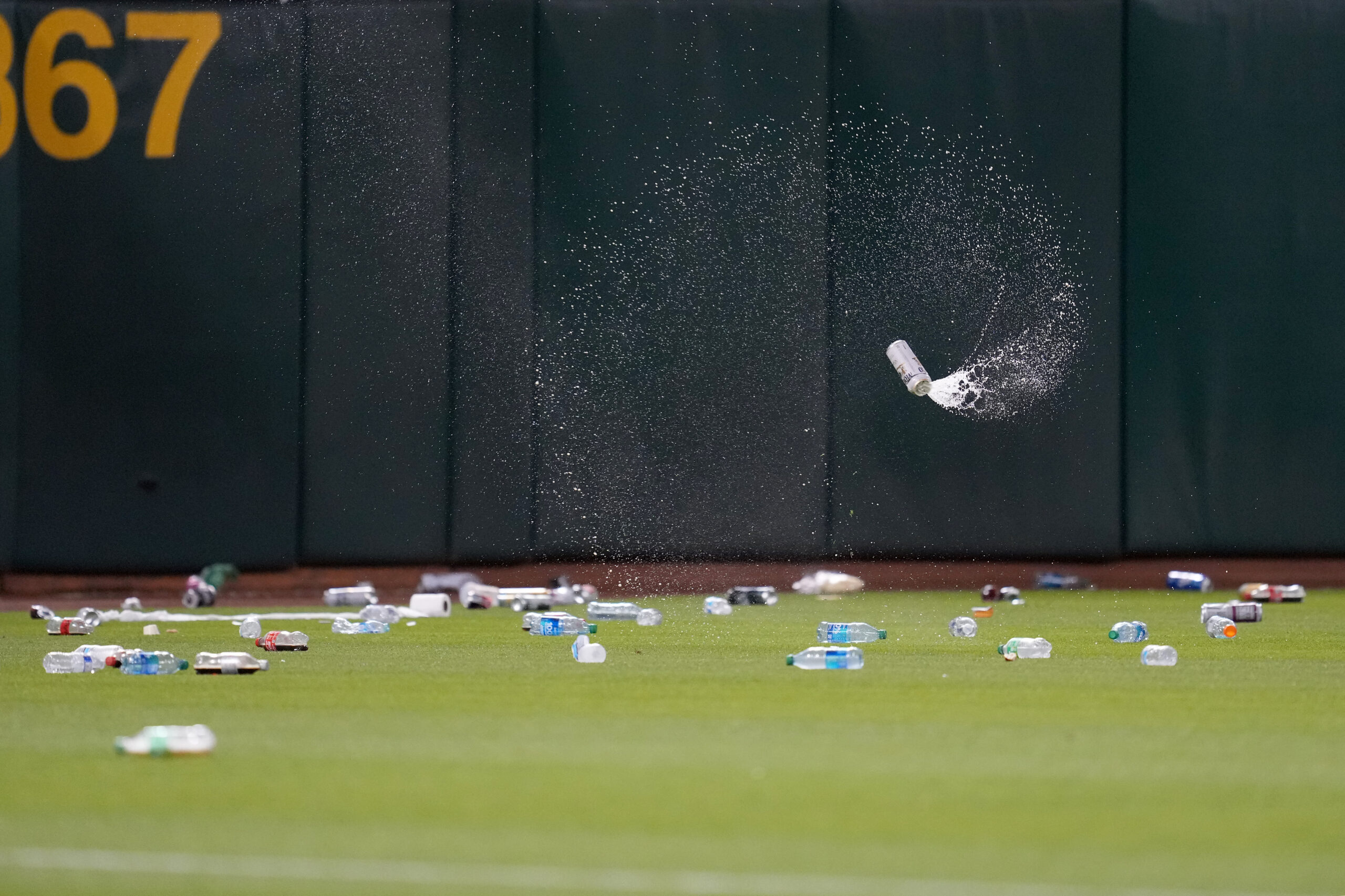 OAKLAND, CALIFORNIA - JUNE 13: Oakland Athletics fans throw garbage onto the field after a reverse boycott game at RingCentral Coliseum on June 13, 2023 in Oakland, California. (Photo by Brandon Vallance/Getty Images)
