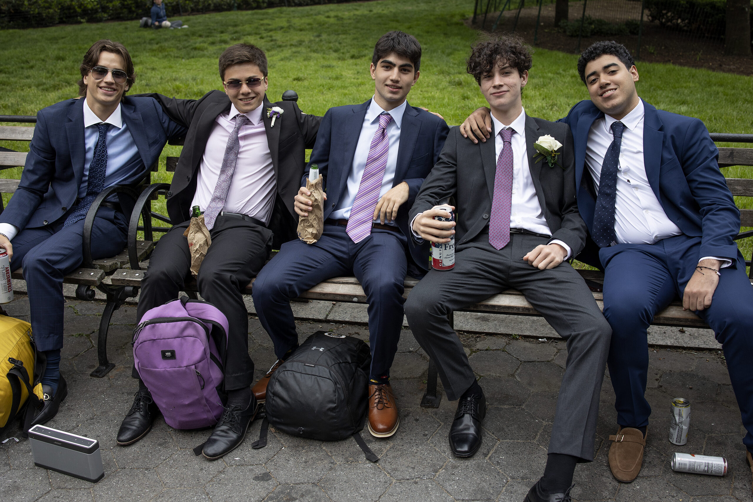 NEW YORK, NEW YORK - MAY 26: High school senior boys prepare for prom night on May 26, 2022 in Union Square Park, New York City. (Photo by Andrew Lichtenstein/Corbis via Getty Images)