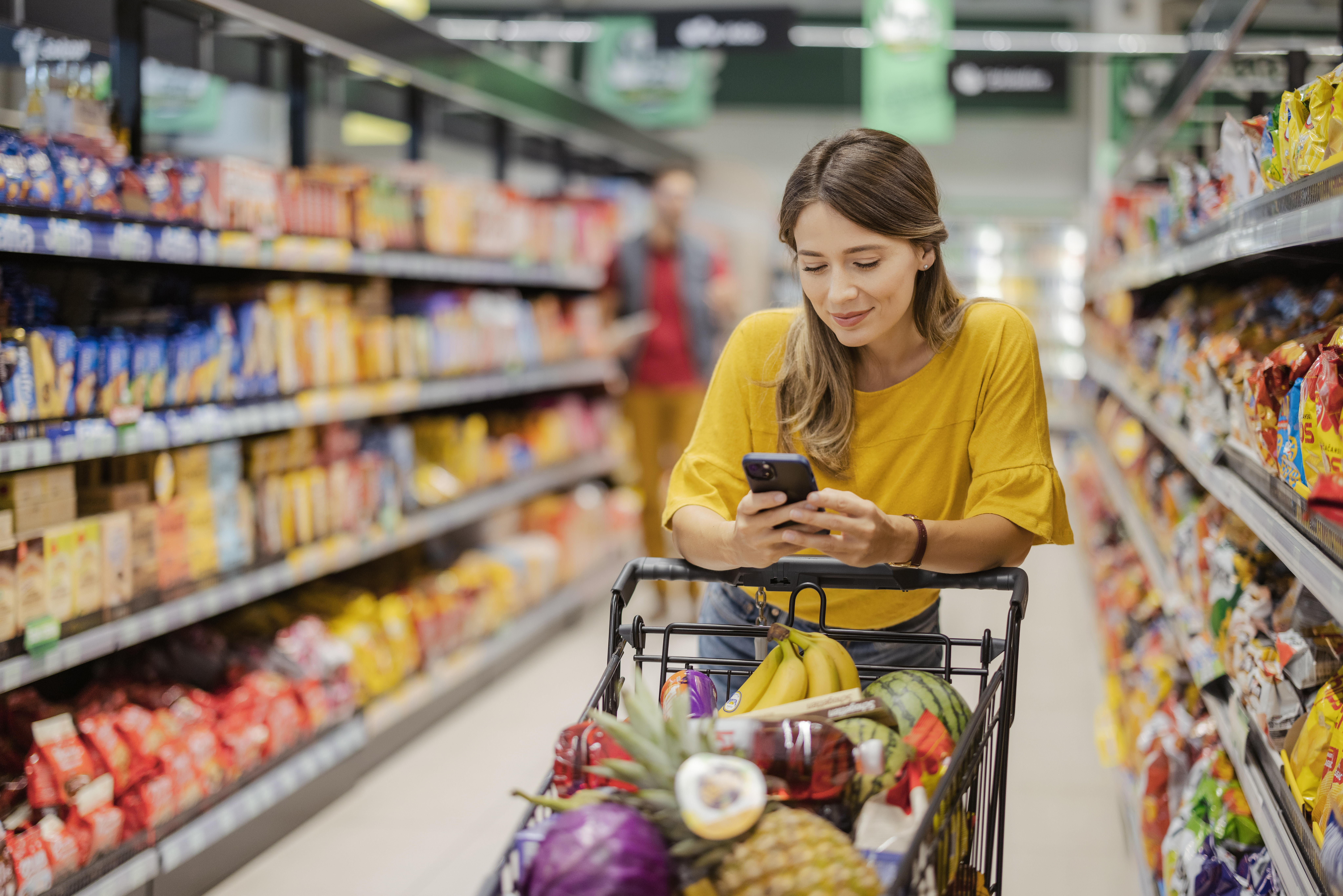 Purchasing Goods with Smartphone at Grocery Store
