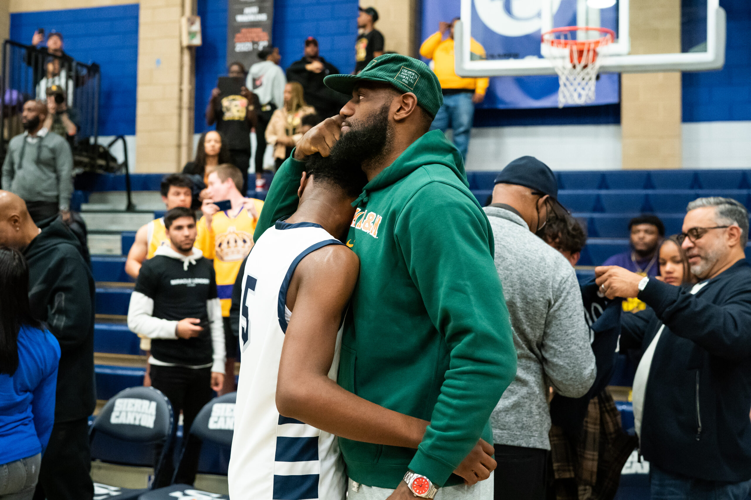 CHATSWORTH, CALIFORNIA - NOVEMBER 16: Bryce James hugs his dad, LeBron James, after the Sierra Canyon vs King Drew boys basketball game at Sierra Canyon High School on November 16, 2022 in Chatsworth, California. (Photo by Cassy Athena/Getty Images)