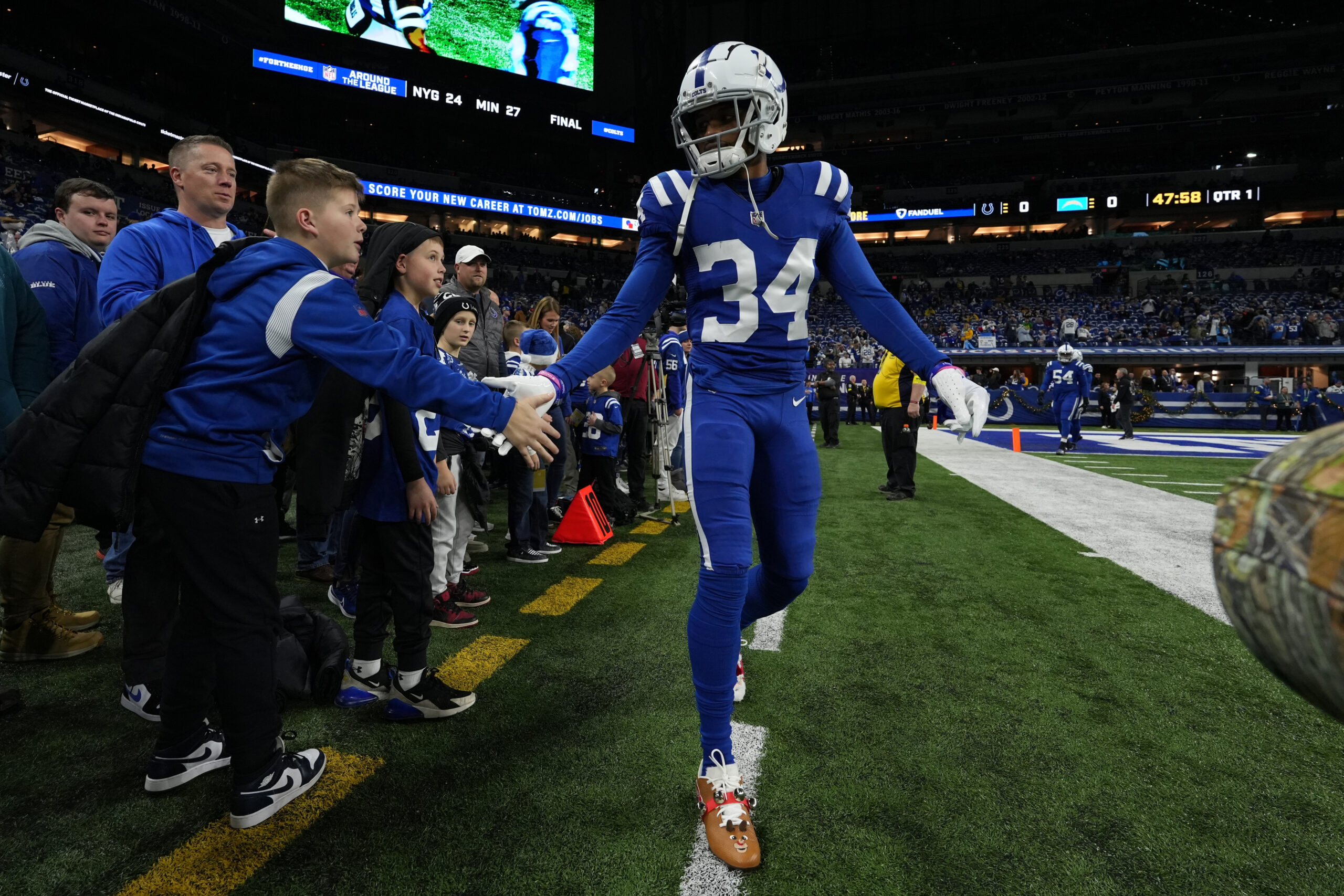 INDIANAPOLIS, INDIANA - DECEMBER 26: Isaiah Rodgers Sr. #34 of the Indianapolis Colts warms up prior to playing the Los Angeles Chargers at Lucas Oil Stadium on December 26, 2022 in Indianapolis, Indiana. (Photo by Dylan Buell/Getty Images)