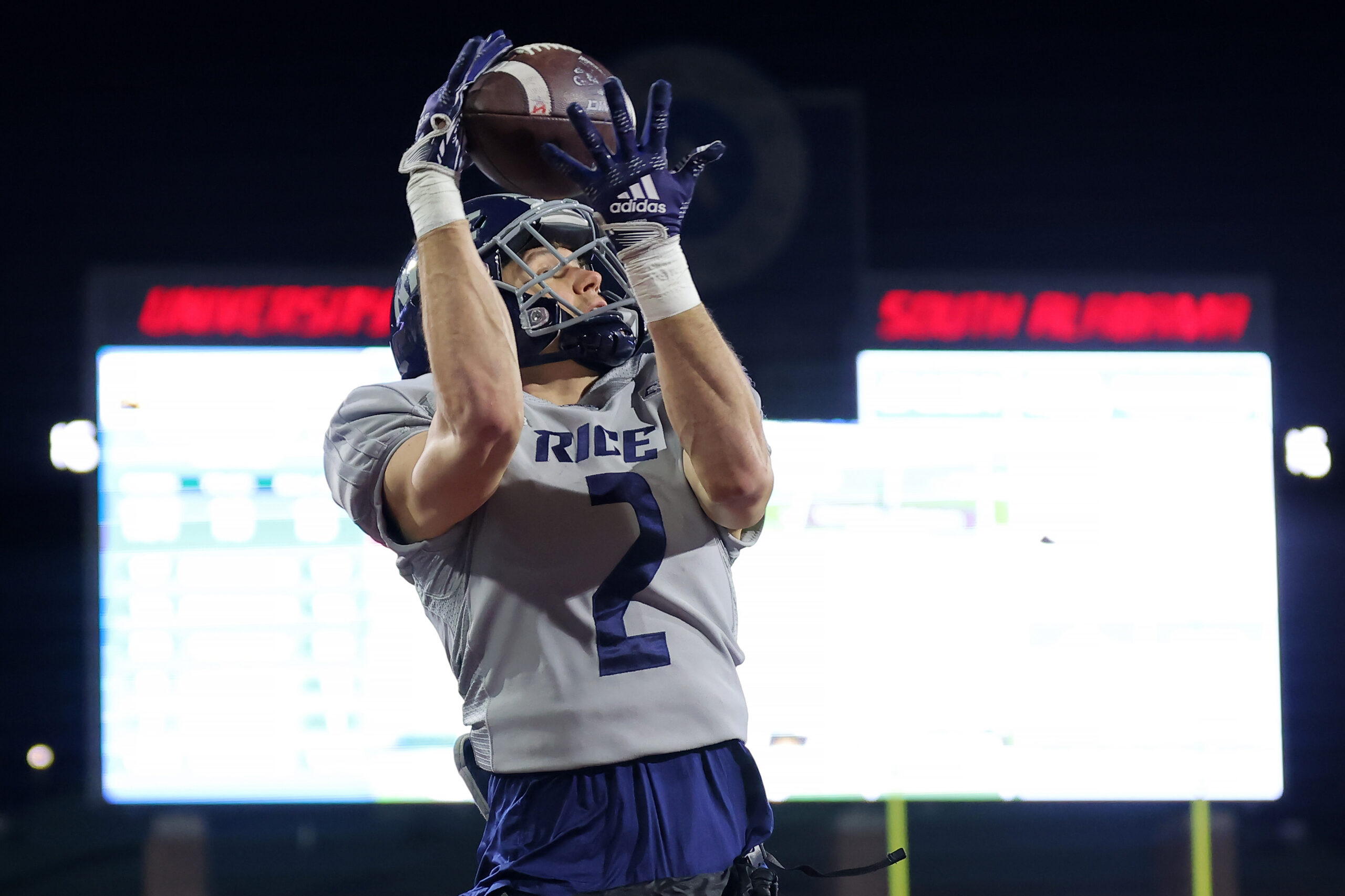 MOBILE, ALABAMA - DECEMBER 17: Bradley Rozner #2 of the Rice Owls catches the ball for a touchdown during the second half of the LendingTree Bowl against the Southern Miss Golden Eagles at Hancock Whitney Stadium on December 17, 2022 in Mobile, Alabama. (Photo by Jonathan Bachman/Getty Images)