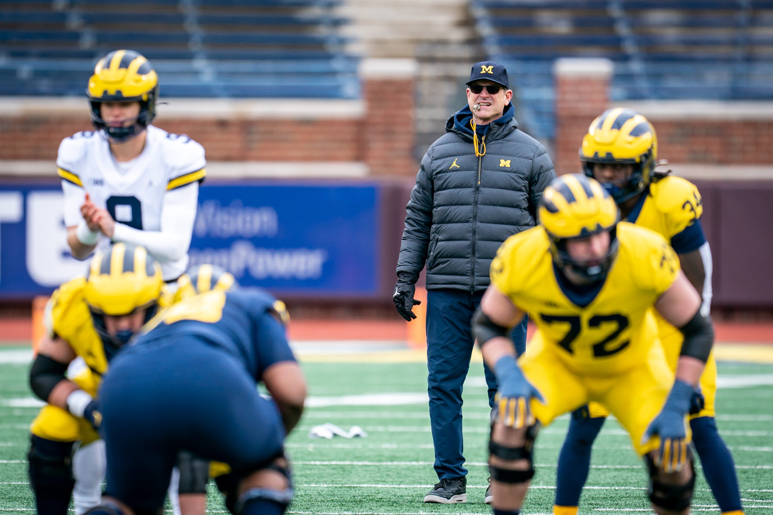 ANN ARBOR, MI - APRIL 01:  Head Coach Jim Harbaugh looks on during a play in the second quarter of the Michigan spring football game at Michigan Stadium on April 1, 2023 in Ann Arbor, Michigan. (Photo by Jaime Crawford/Getty Images)