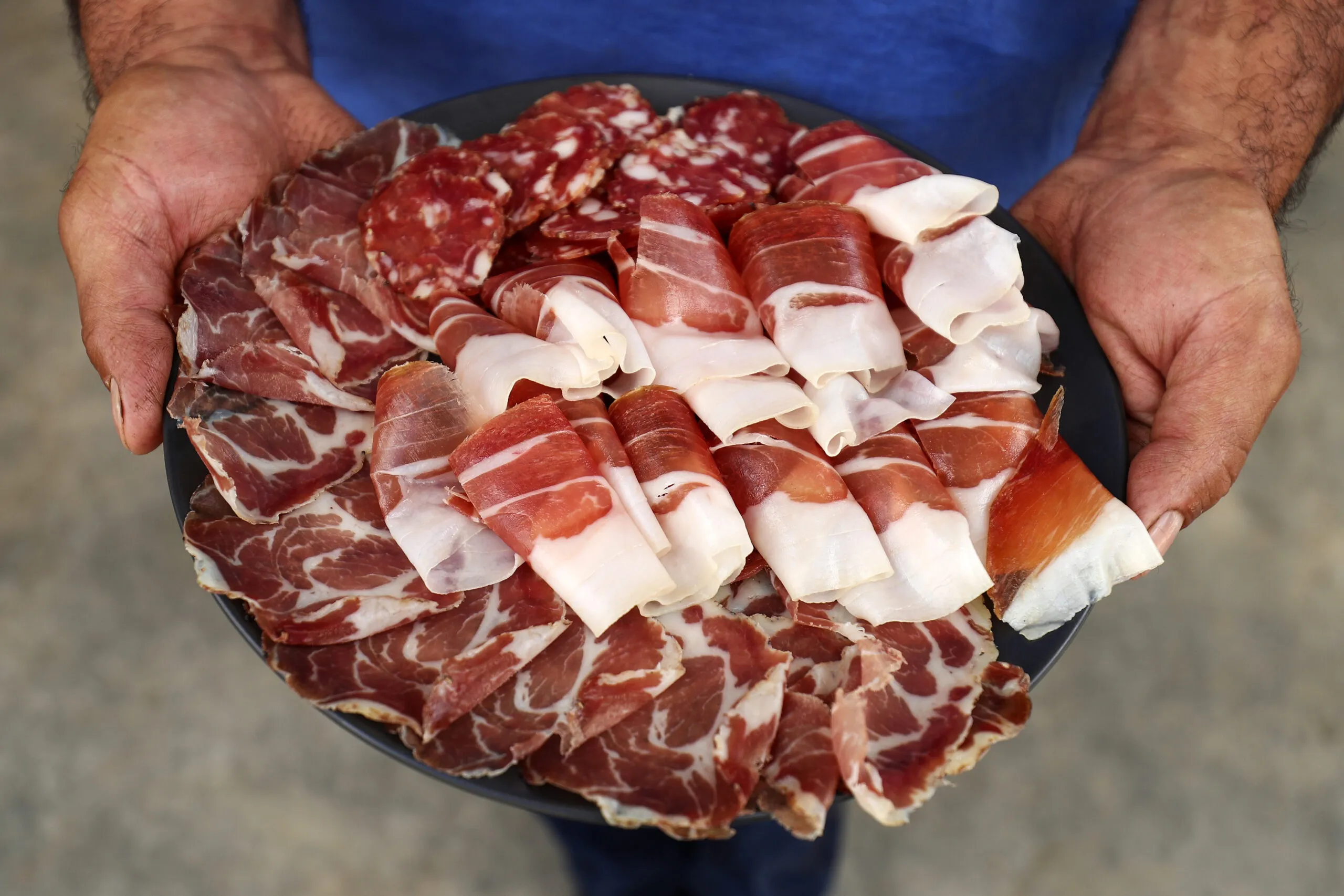A plate of cured pork; capocollo, prosciutto and salami at Taluca Park free range farm in Exeter, Australia, on Thursday, Jan. 14, 2021. Australia's economy is recovering strongly and sentiment and hiring consistently improved in late 2020 as authorities managed to bring the virus under control. Photographer: Brendon Thorne/Bloomberg via Getty Images