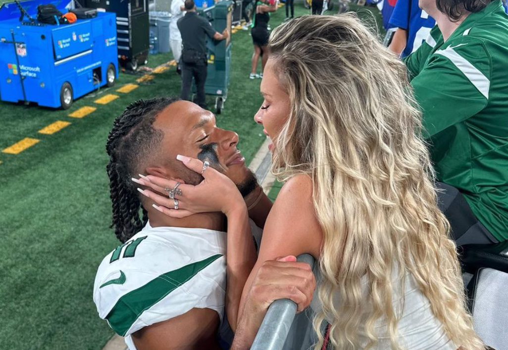 Jets’ Jermaine Johnson Kisses Model Girlfriend After Game